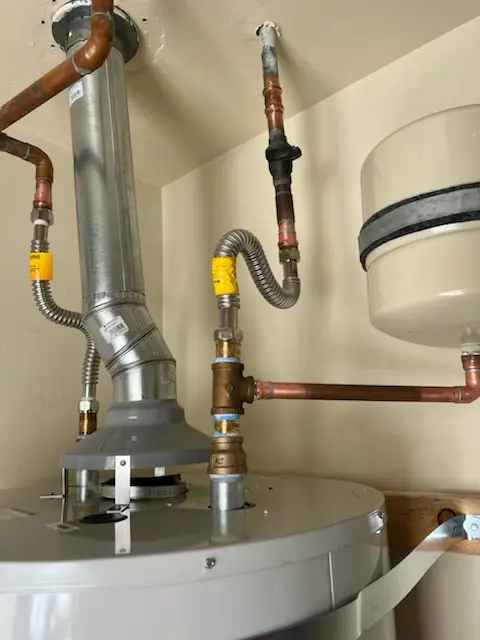 Water heater installation and plumbing repair in Normal